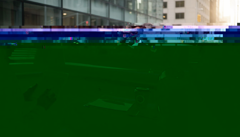 Chauffeur opening car door at city building